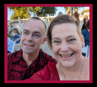 a "selfie" of a man on the left and a woman on the right, posing at a wedding
